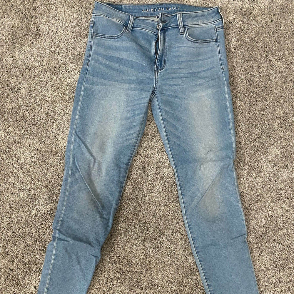 Light blue distressed jeans - 8 regular - American Eagle